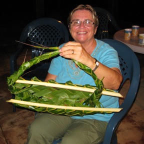 Linda Miller weaving with palm fronds