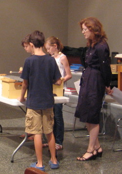 Anna Womack working with children providing music for the Jesse Tree Liturgy