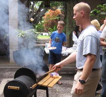 Stephen Schmidt grilled up cheeseburgers and hotdogs