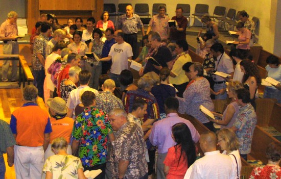 Everyone present surrounded the Barbers for the final prayer.