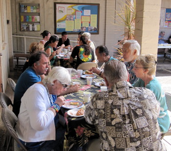 Members and friends shared in potluck to bring the summer schedule to an end.