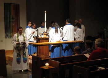 Pastor Angela leads the prayers during the first Evening Prayer service.