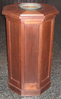 The wooden baptismal font