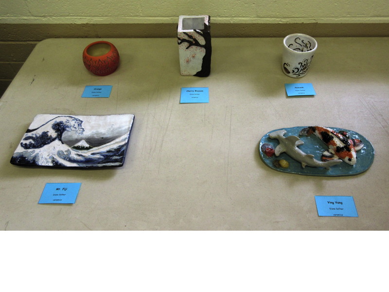 Items Displayed at Faith and Arts Sunday (clockwise from top left)—“Orange,“ “Cherry Blossom,” “Peacock,” “Ying Yang,” and “Mt. Fiji” (ceramics) by Diana Sellner