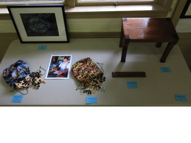 Items Displayed at Faith and Arts Sunday (clockwise from top left)—“Arizona” (photograph) by Richard Cook; “Side Table” (Broken LCH pew) and “Carved Travel Cribbage” (teak) by Jeff Lilley; “Winnie’s Family” (Wooden puzzles and photo) by Don Johnson